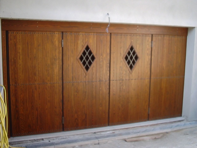Portone in ferro con rivestimento in legno carpenteria ... Cancelli rivestiti in legno